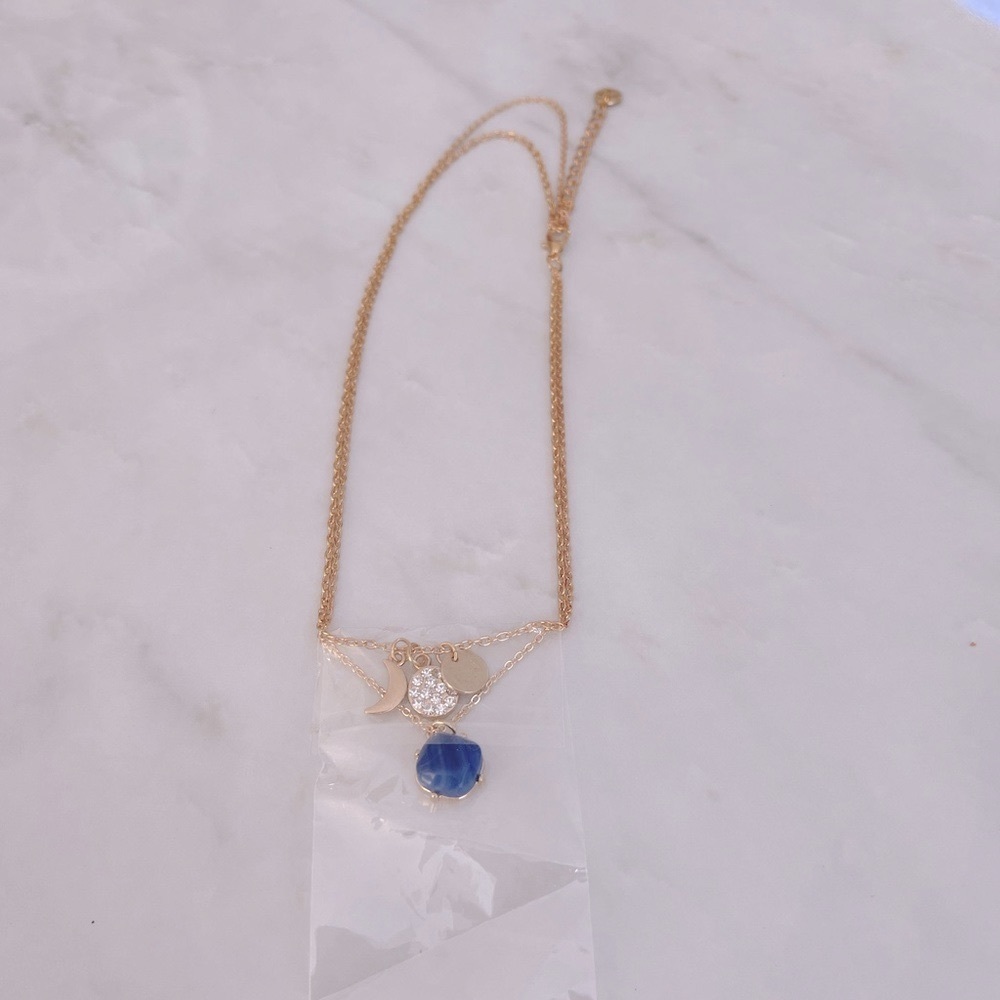 Gold Charm Necklace With Moon & Blue Gem